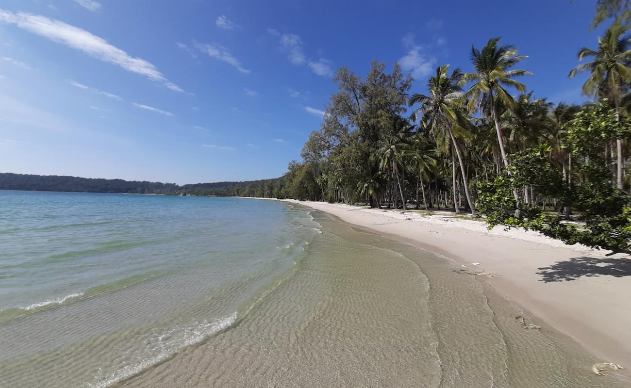 Фото Tansor Beach с белый песок поверхностью