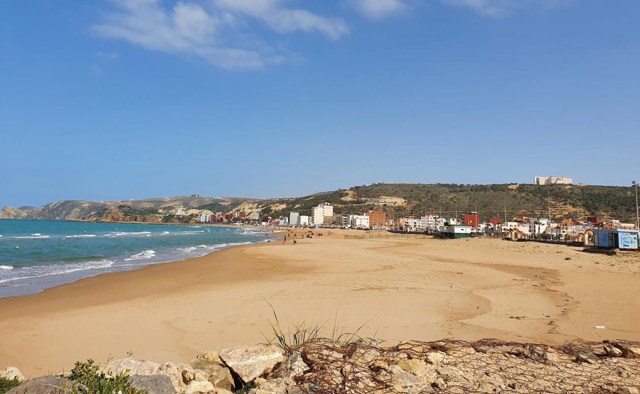 Фото Plage de Marsa с золотистый песок поверхностью