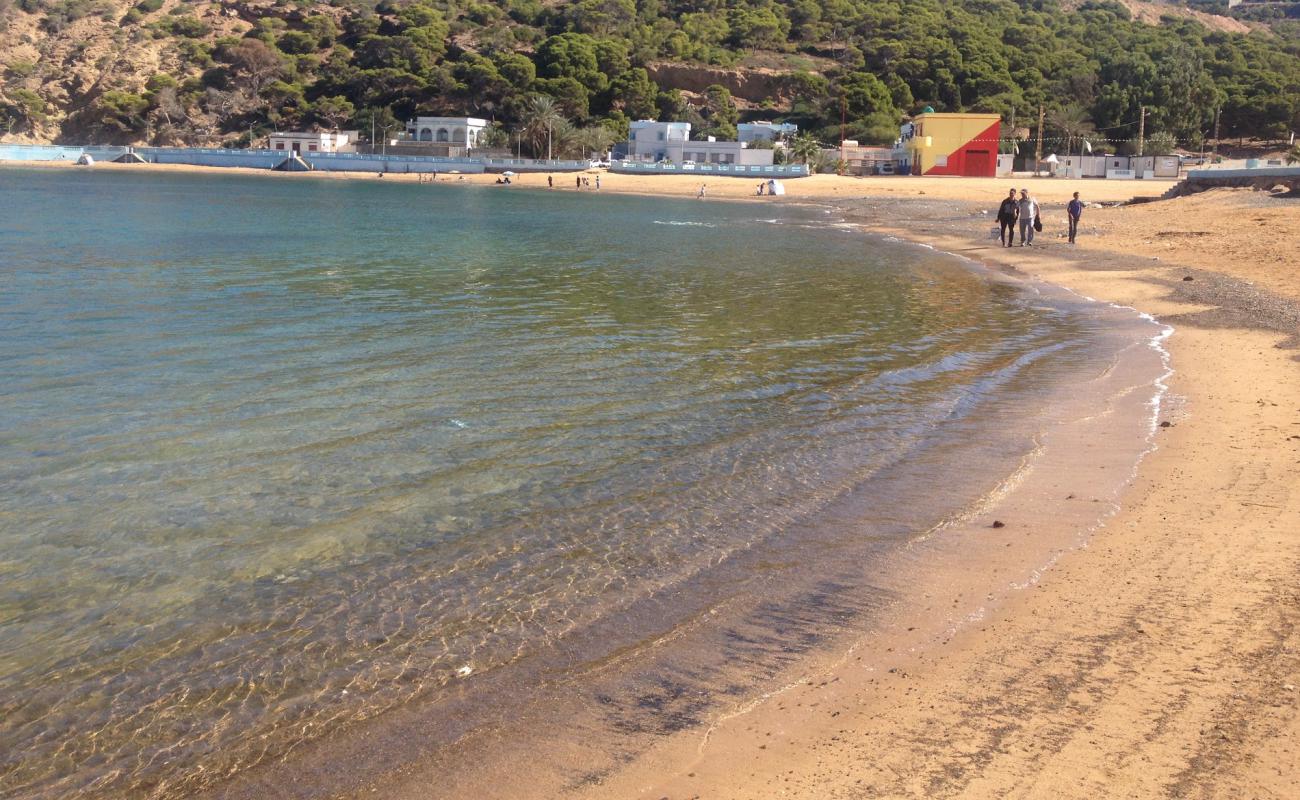 Фото Plage Tafsout с песок с галькой поверхностью