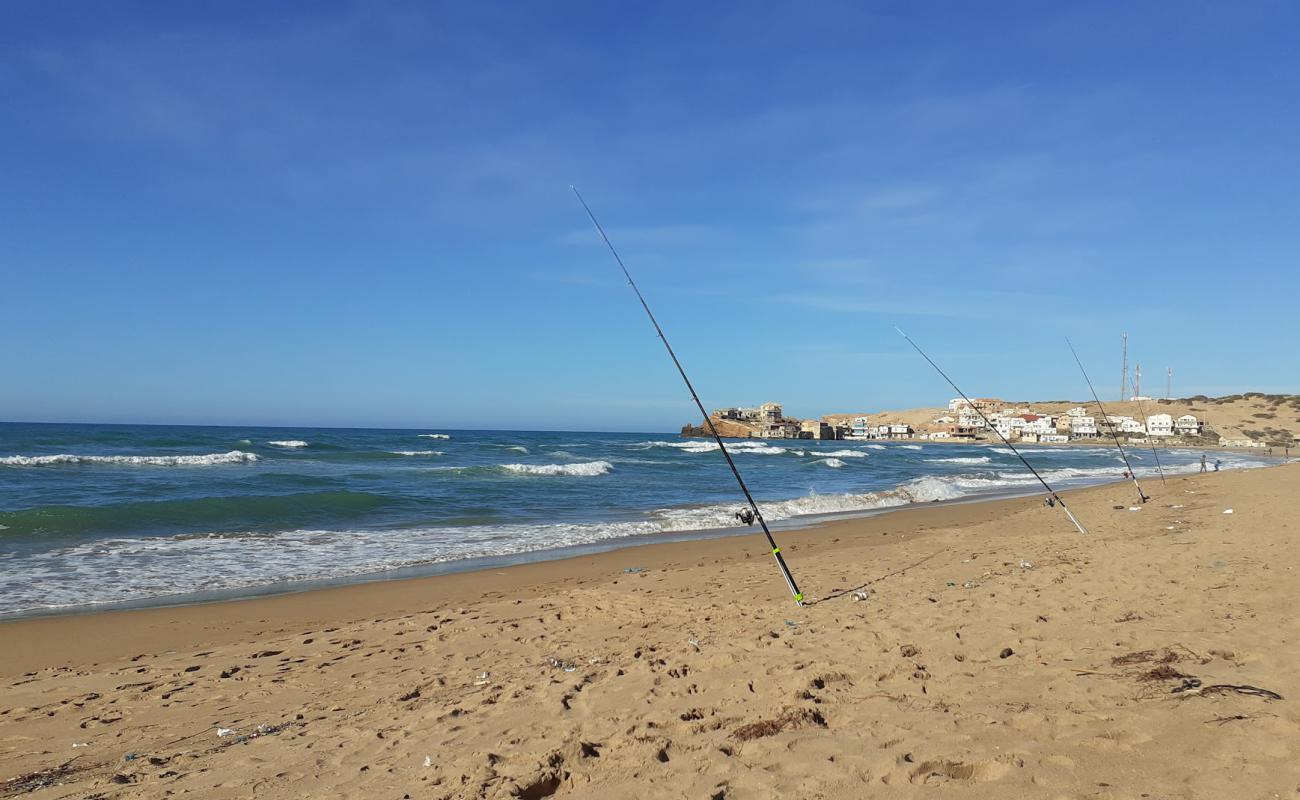 Фото Plage Terga с светлый песок поверхностью