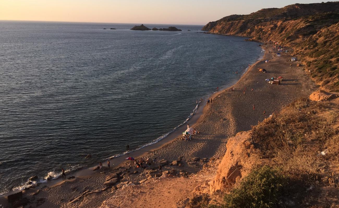 Фото Plage Madegh 0 с светлый песок поверхностью