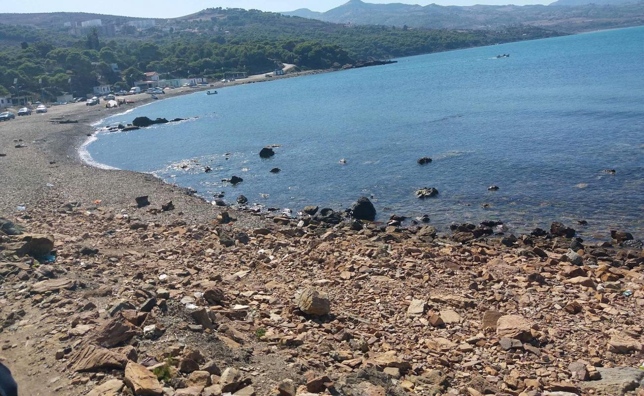 Фото Plage de Beni Haoua с камни поверхностью