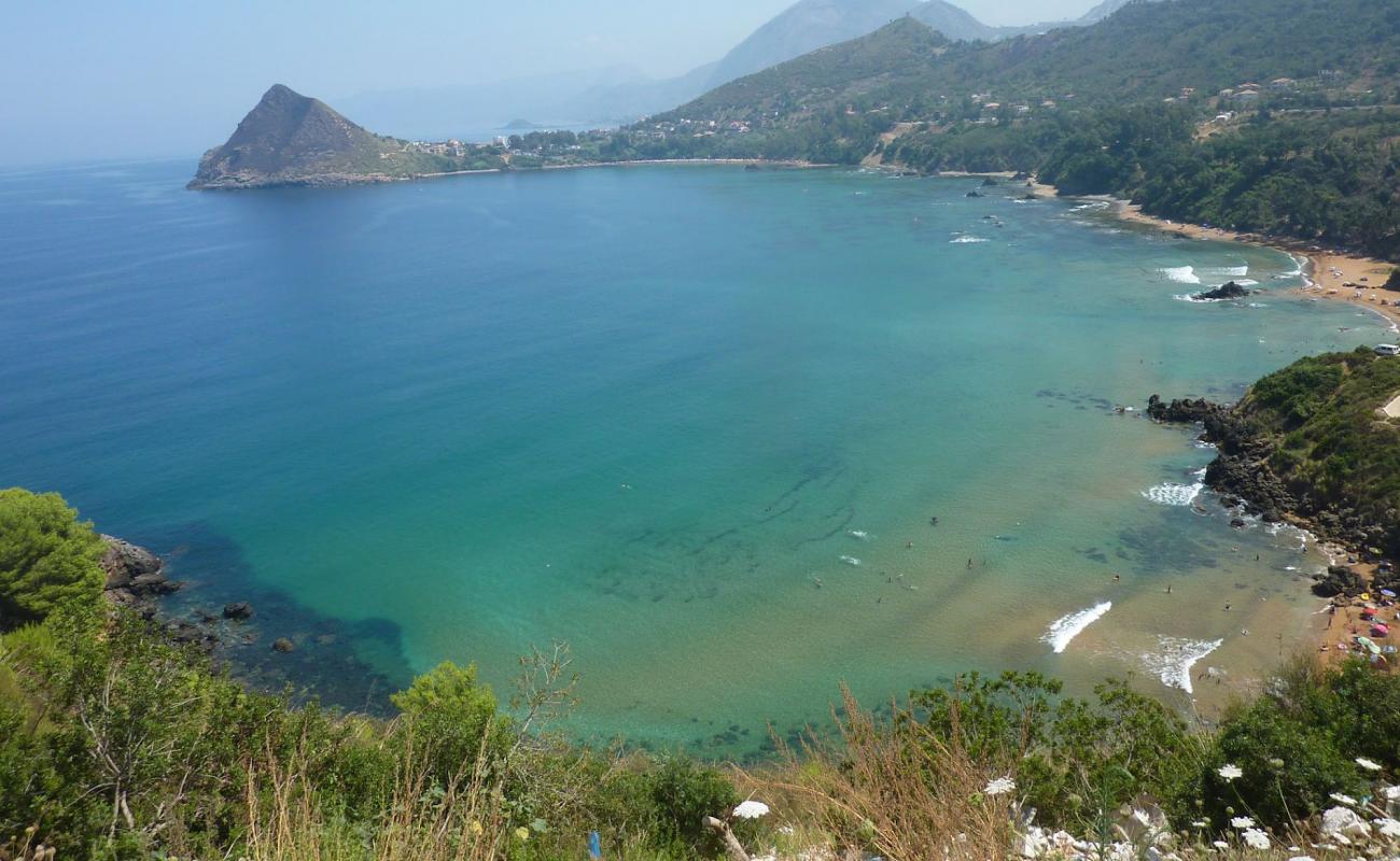 Фото Plage d'Afaghir с светлый песок поверхностью