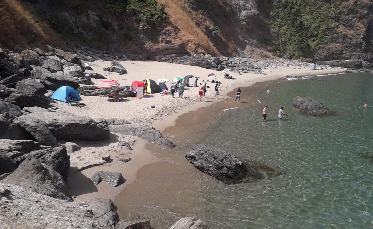 Фото Plage Remila с светлый песок поверхностью