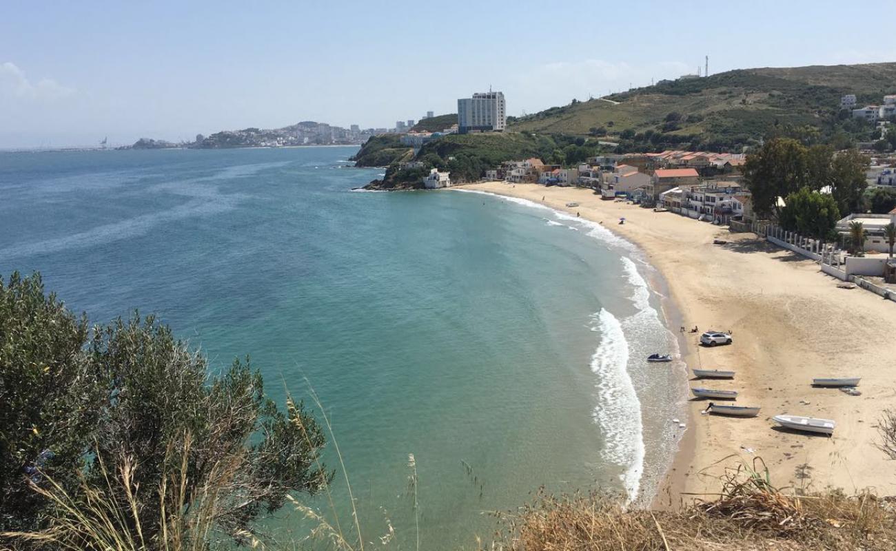 Фото Plage Toche с золотистый песок поверхностью