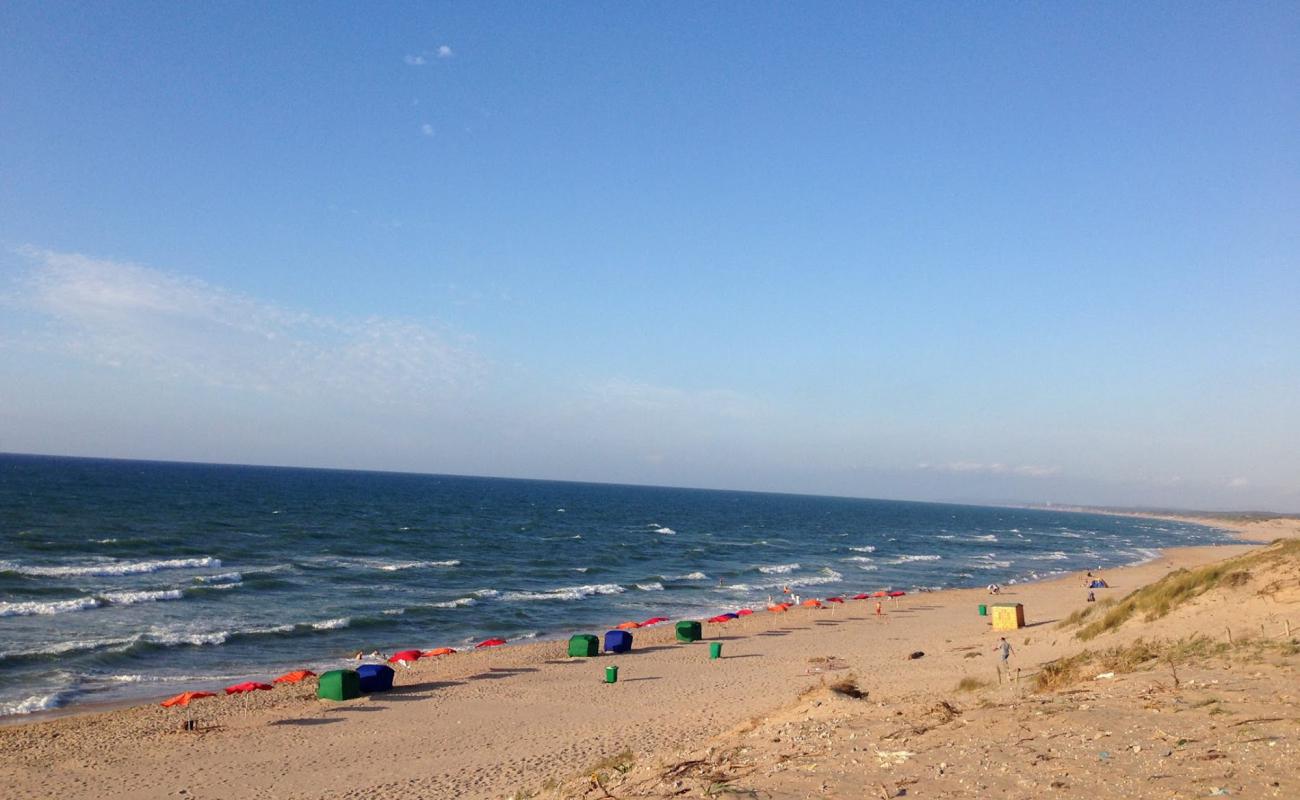 Фото Plage El Betah с светлый песок поверхностью