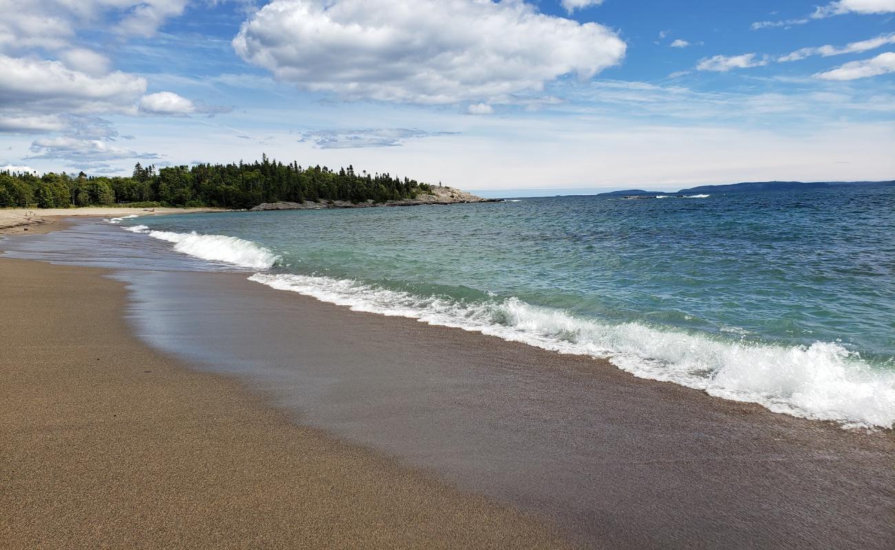 Фото Terrace Bay Beach с светлый песок поверхностью