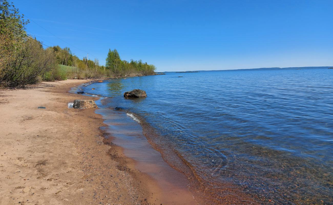 Фото Wild Goose Beach с светлый песок поверхностью