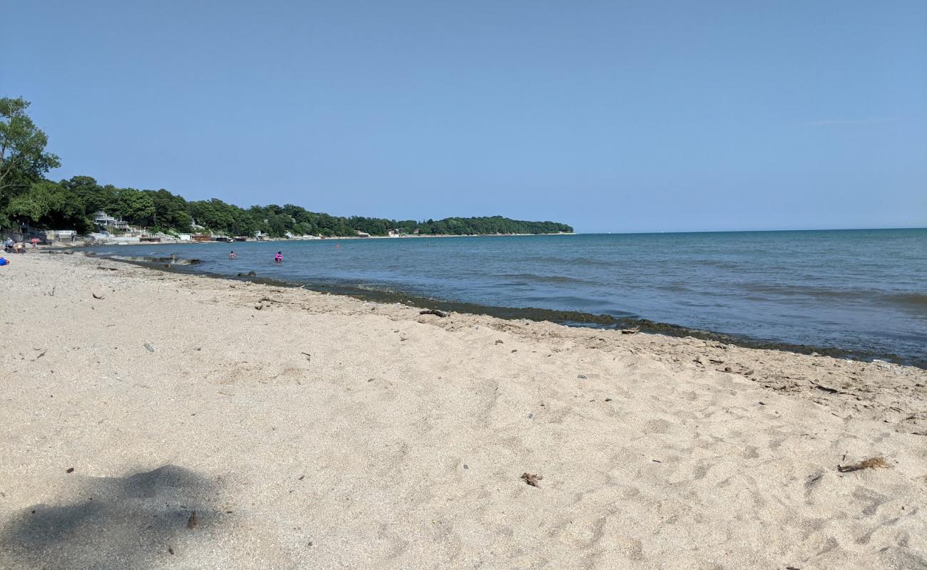 Фото Reebs Bay Public Beach с песок с галькой поверхностью