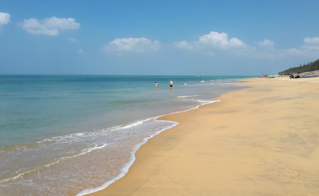 Фото Kasakale beach с светлый песок поверхностью