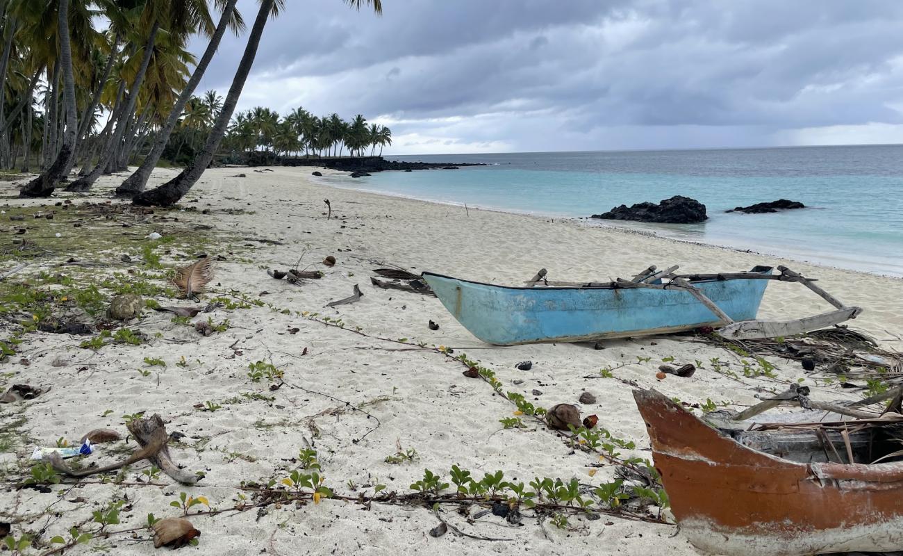 Фото Plage Galawa с светлый песок поверхностью