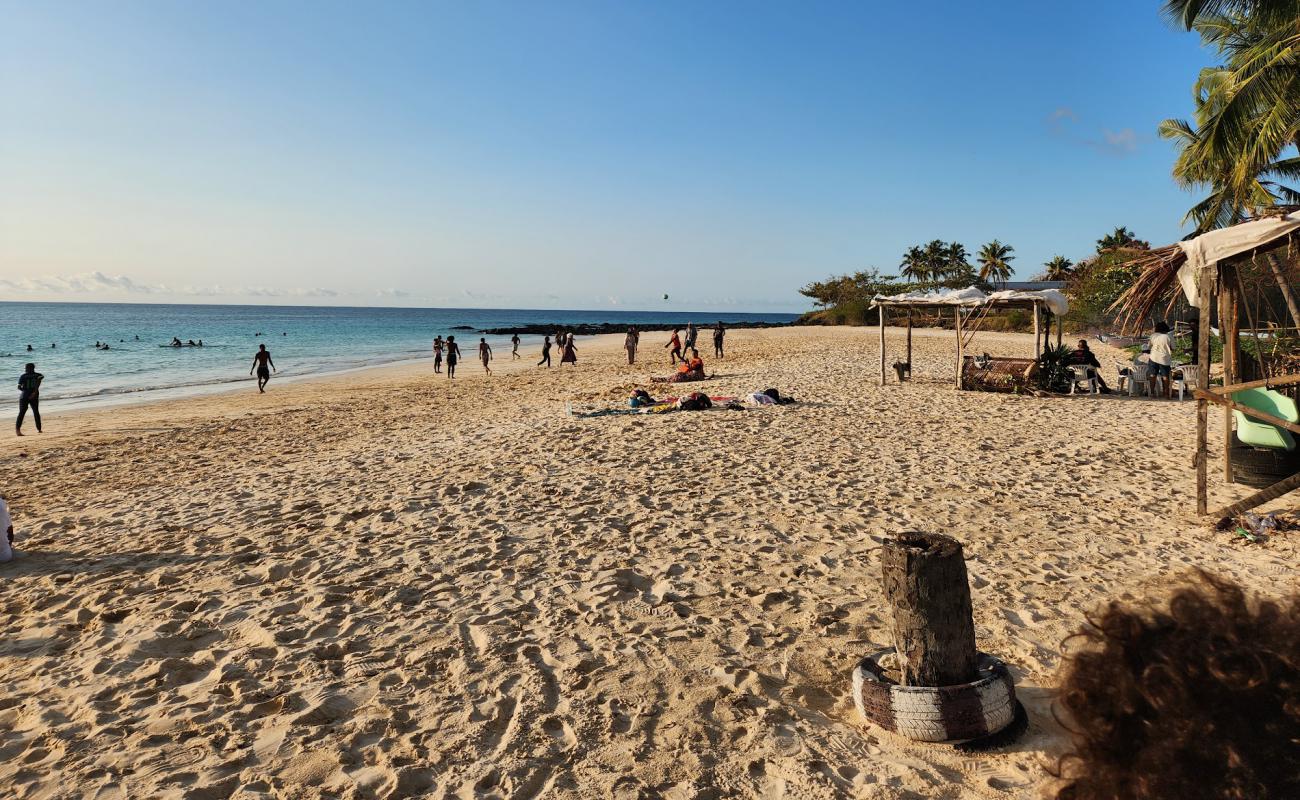 Фото Planete Plage с светлый песок поверхностью