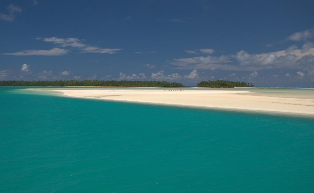 Фото Aitutaki Sandbank с белый чистый песок поверхностью