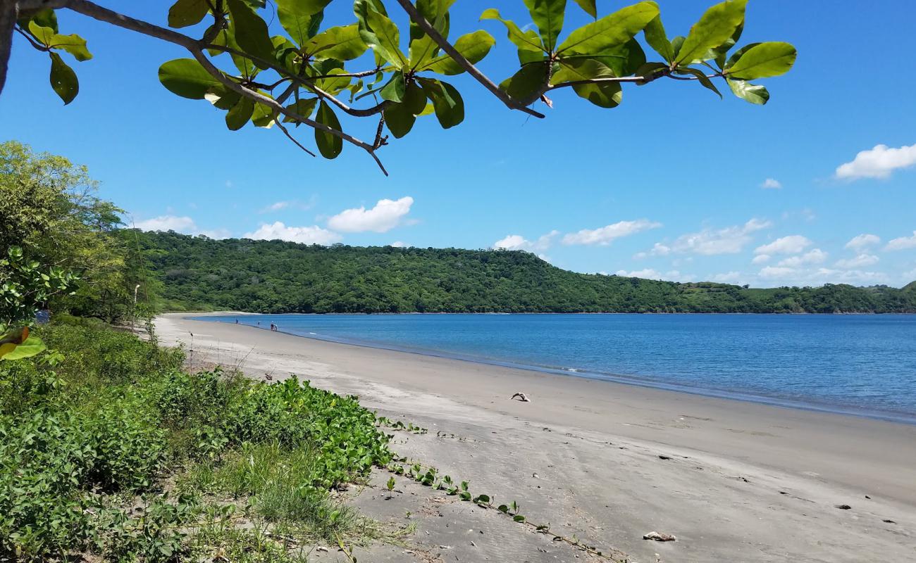 Фото Iguanita beach с светлый песок поверхностью