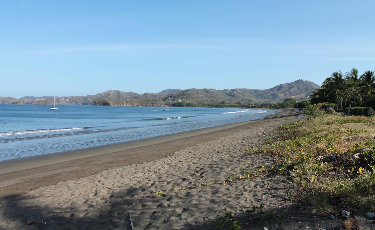 Фото Potrero Beach с серый песок поверхностью