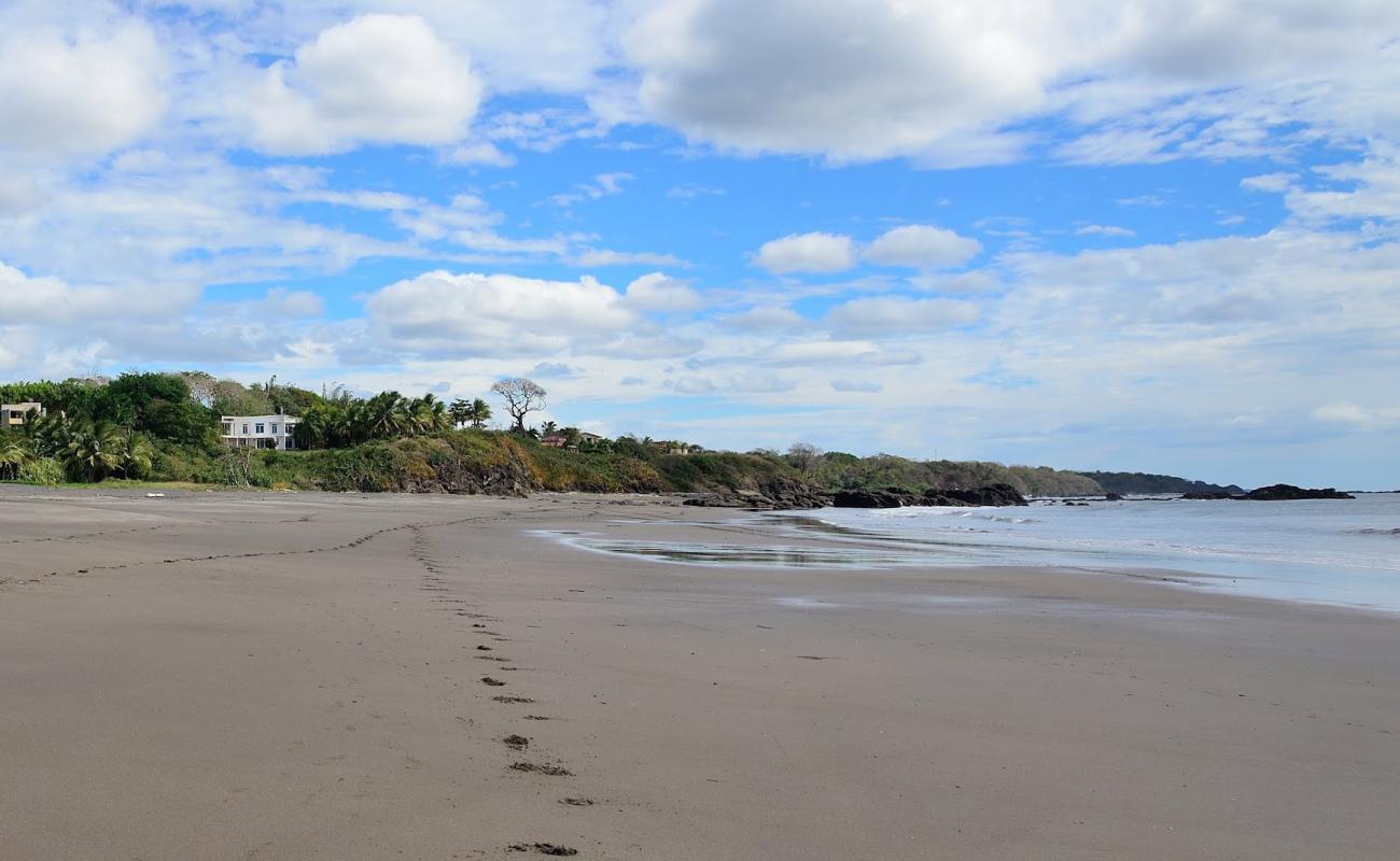 Фото Playa Azul с песок с камнями поверхностью