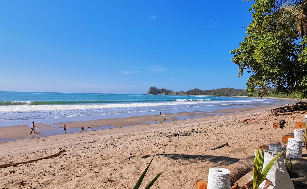 Фото Playa Garza с светлый песок поверхностью