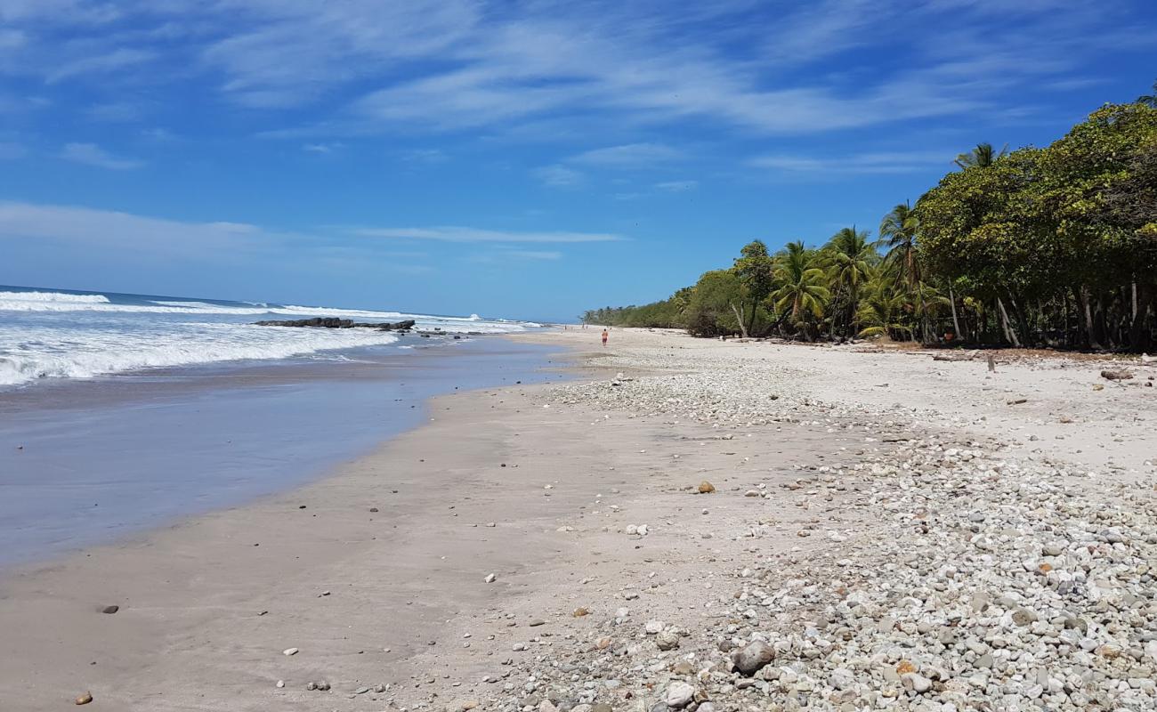 Фото Santa Teresa Beach с песок с галькой поверхностью