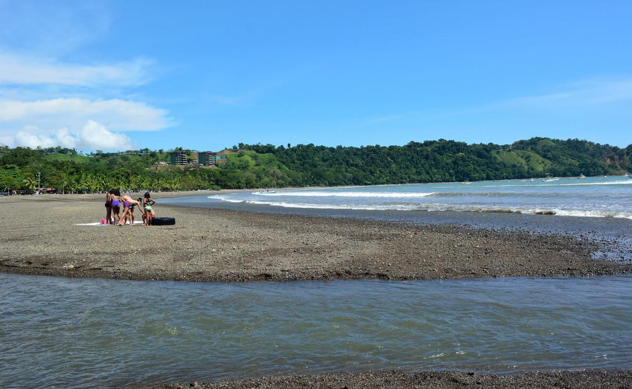 Фото Playa Herradura с песок с галькой поверхностью