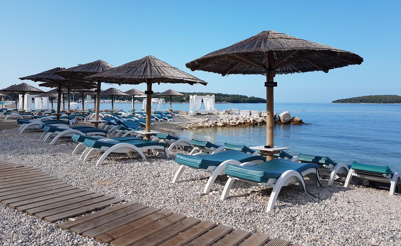 Фото Polidor beach с белая чистая галька поверхностью