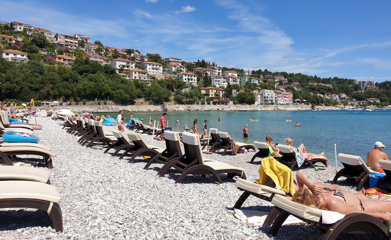 Фото Maslinica beach с светлая галька поверхностью