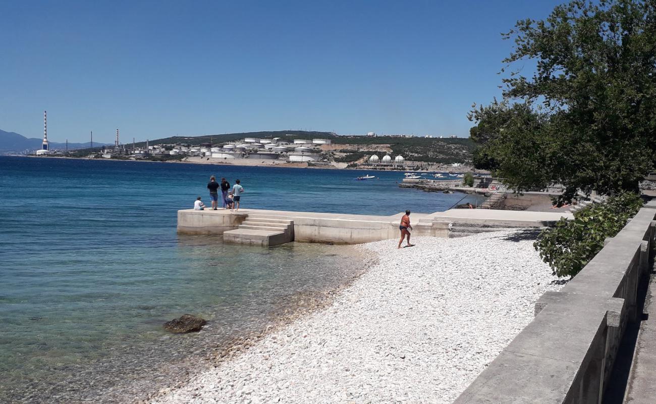 Фото Ostro beach с камни поверхностью