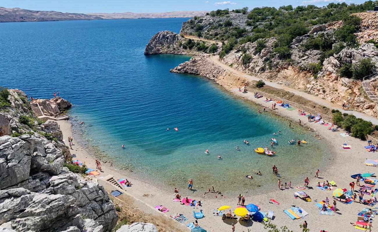 Фото Tatinja beach с белая чистая галька поверхностью