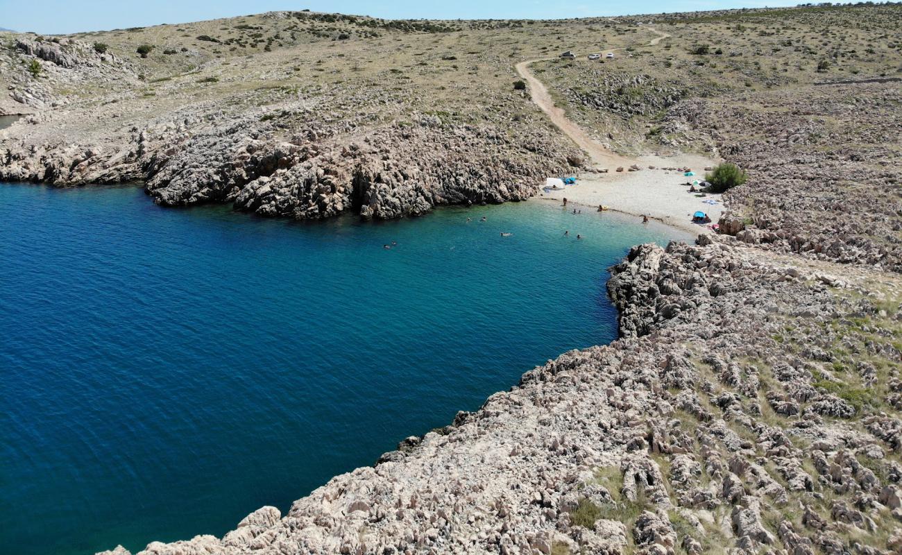 Фото Sipa beach с светлая галька поверхностью