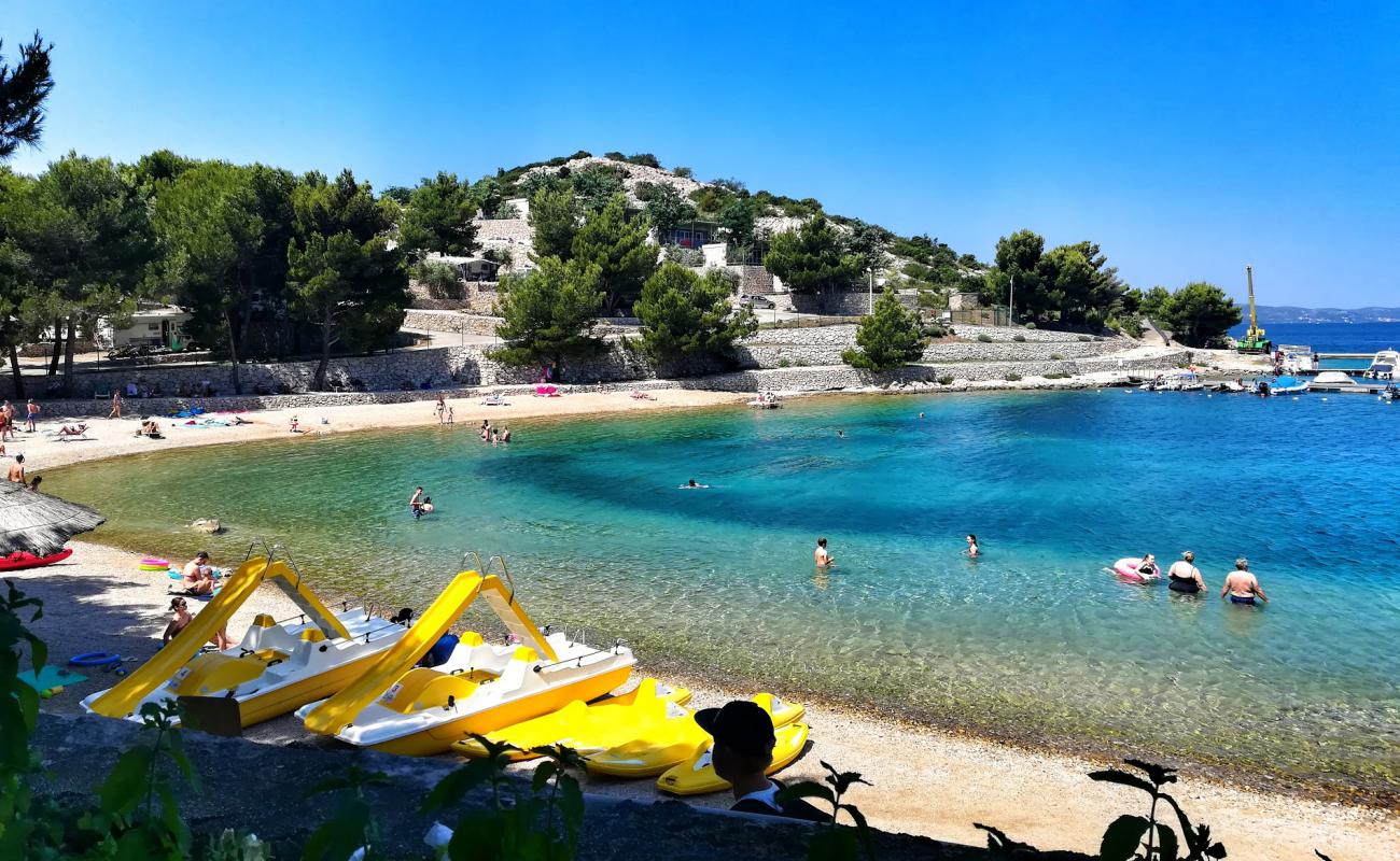 Фото Oaza Mira beach с белая чистая галька поверхностью