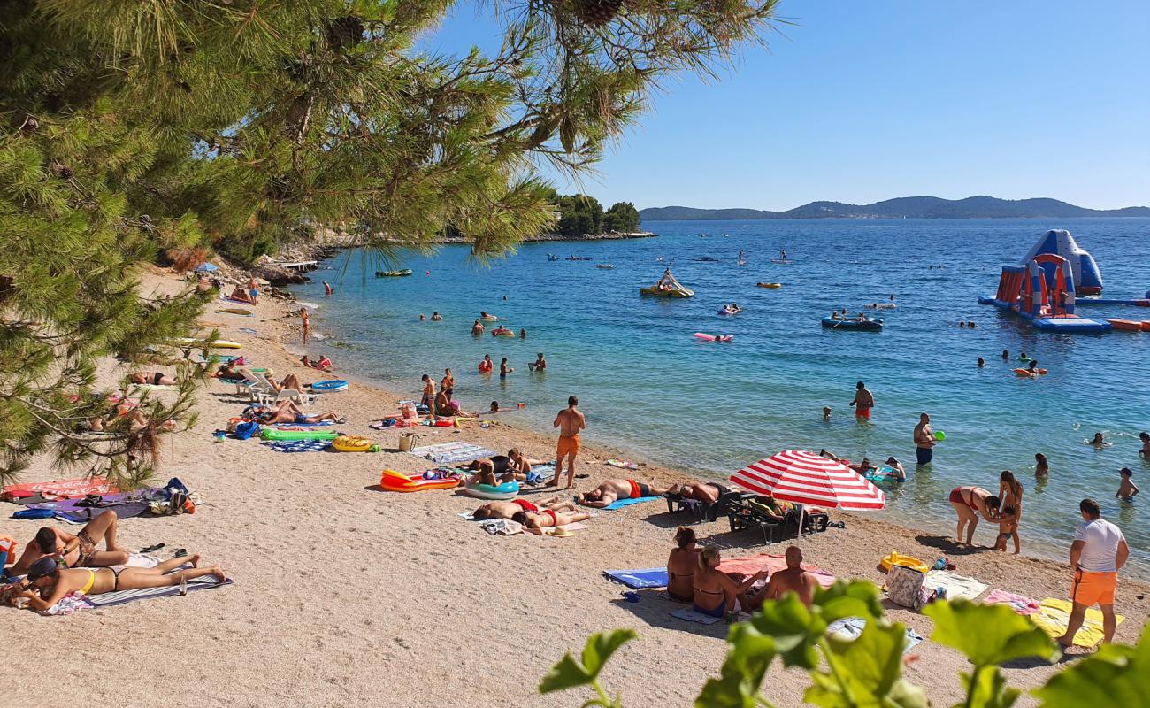 Фото Porat beach с белая чистая галька поверхностью