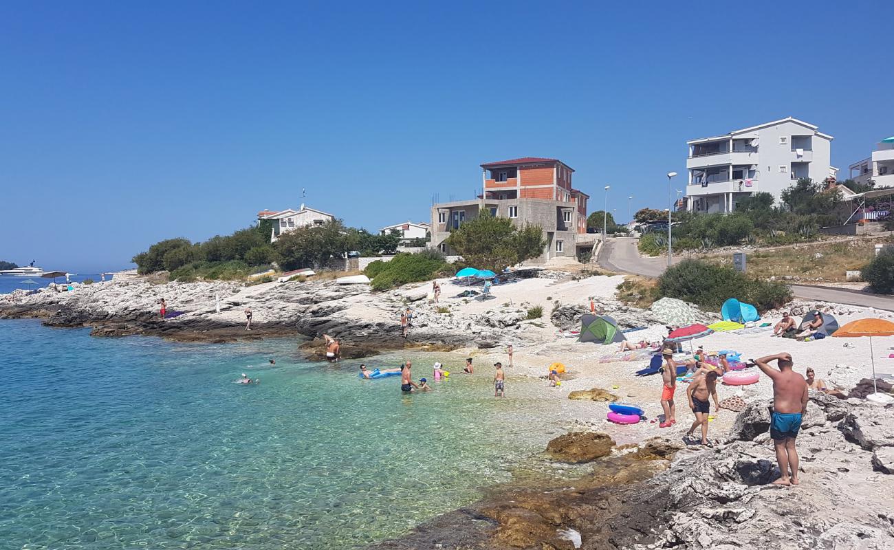 Фото Zecevo beach с белая чистая галька поверхностью