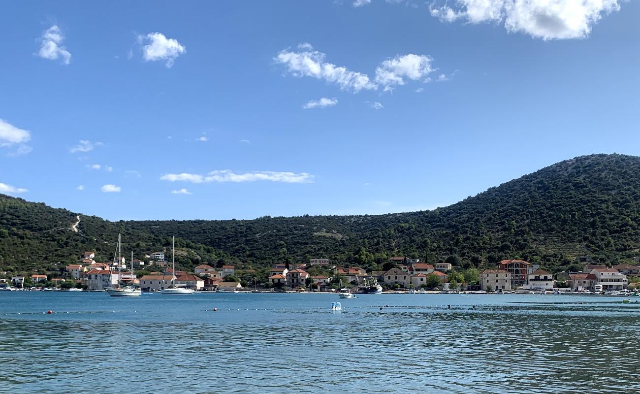 Фото Zagrada beach с светлая галька поверхностью