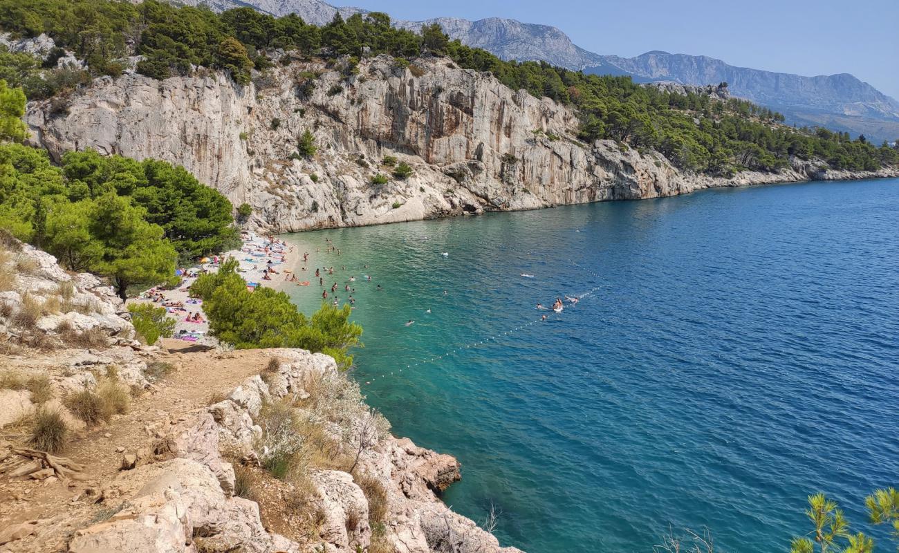 Фото Nugal beach с светлая галька поверхностью