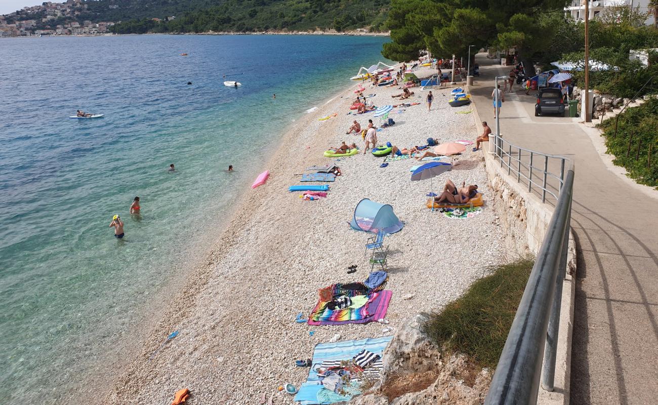 Фото Porat beach с светлая галька поверхностью