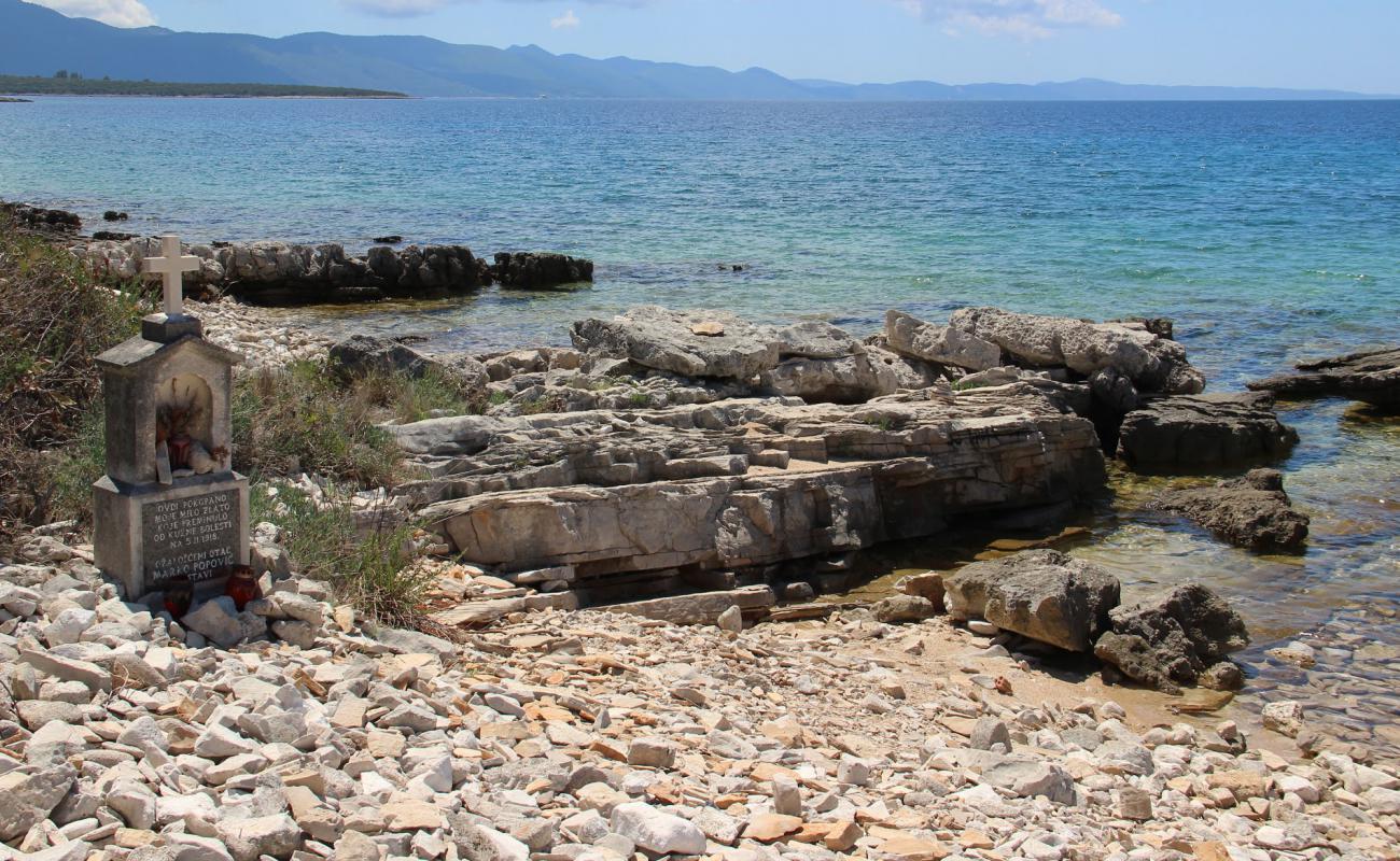 Фото Denka FKK beach с камни поверхностью