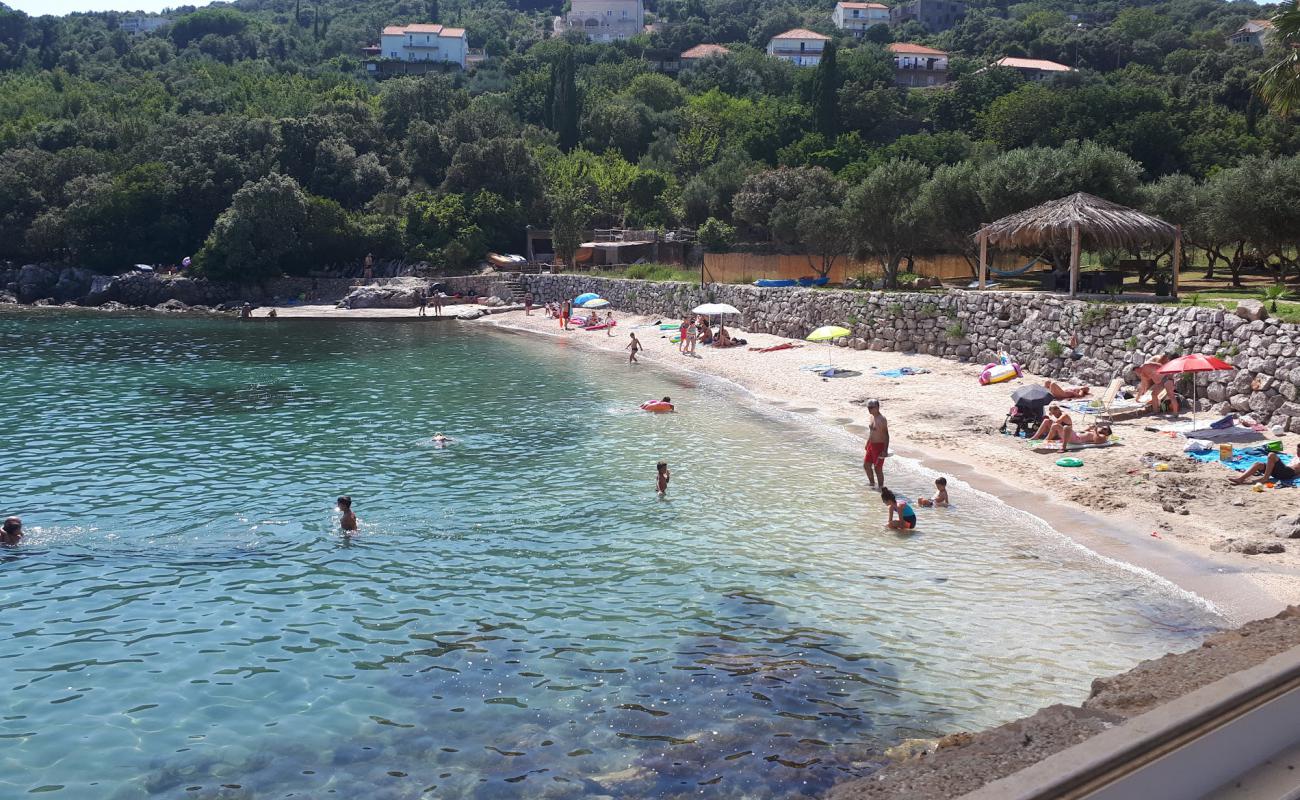 Фото Molunat beach с белая чистая галька поверхностью