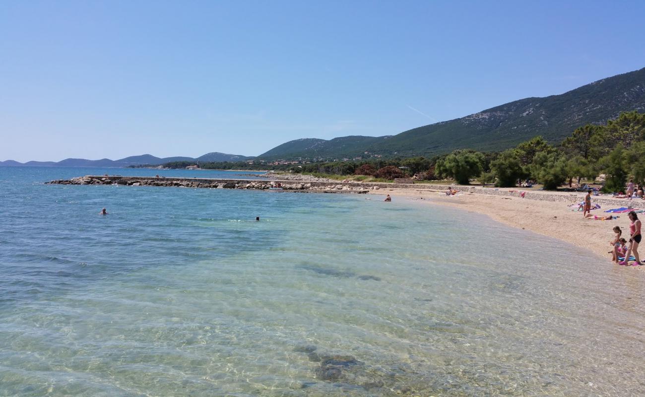 Фото Lopari beach с белая чистая галька поверхностью