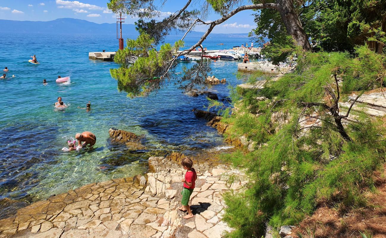 Фото Paradise beach с белая чистая галька поверхностью