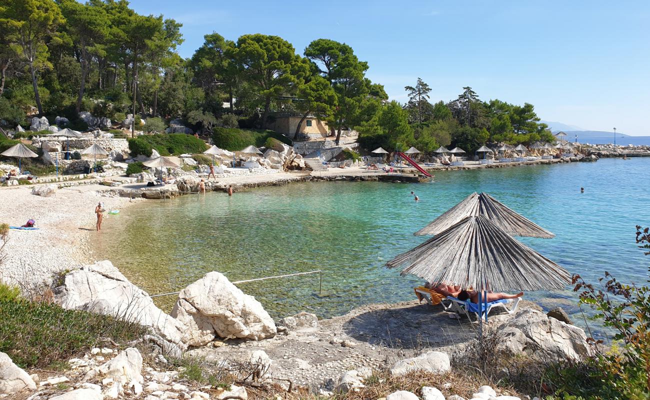 Фото Kandarola III beach с камни поверхностью