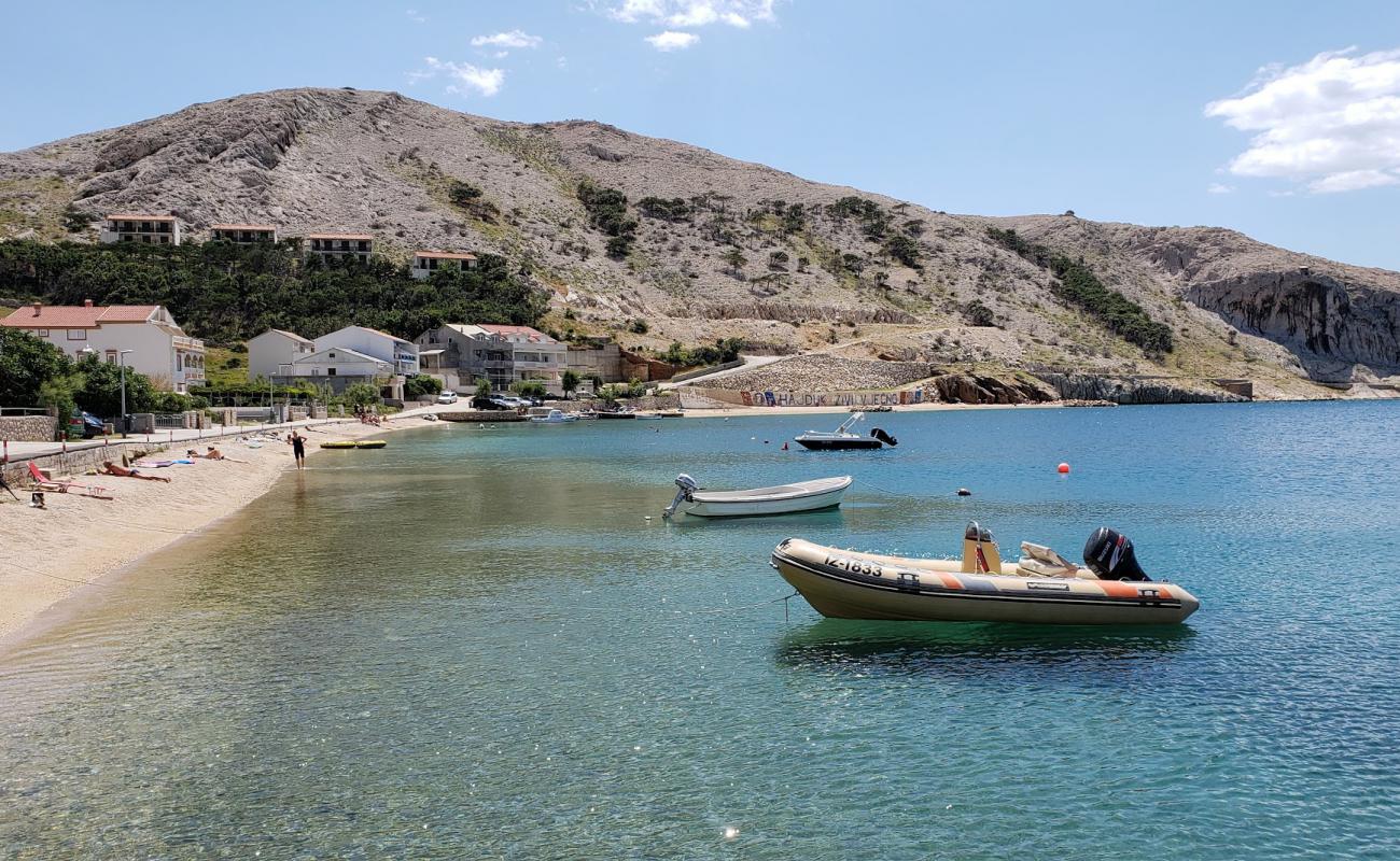 Фото Metajna beach с светлая галька поверхностью