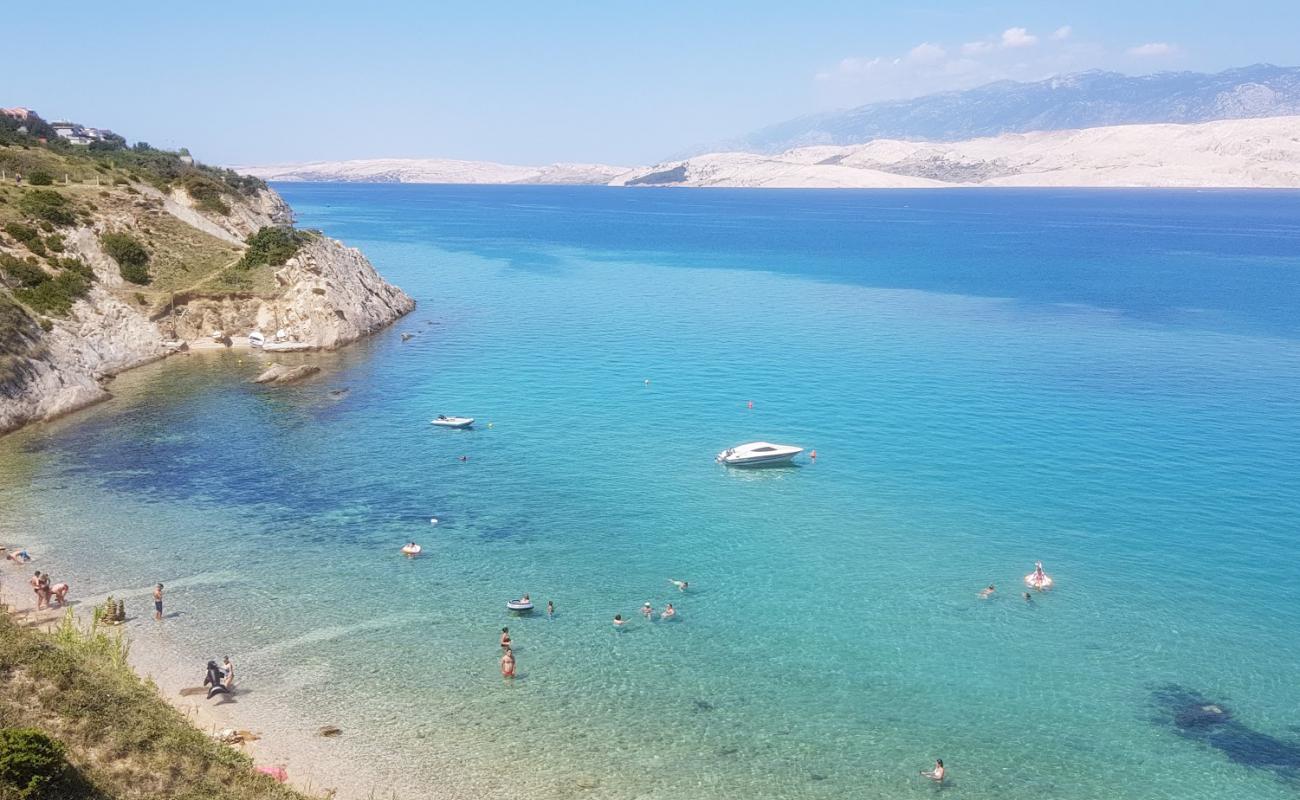 Фото Kozlinjak beach с белая чистая галька поверхностью