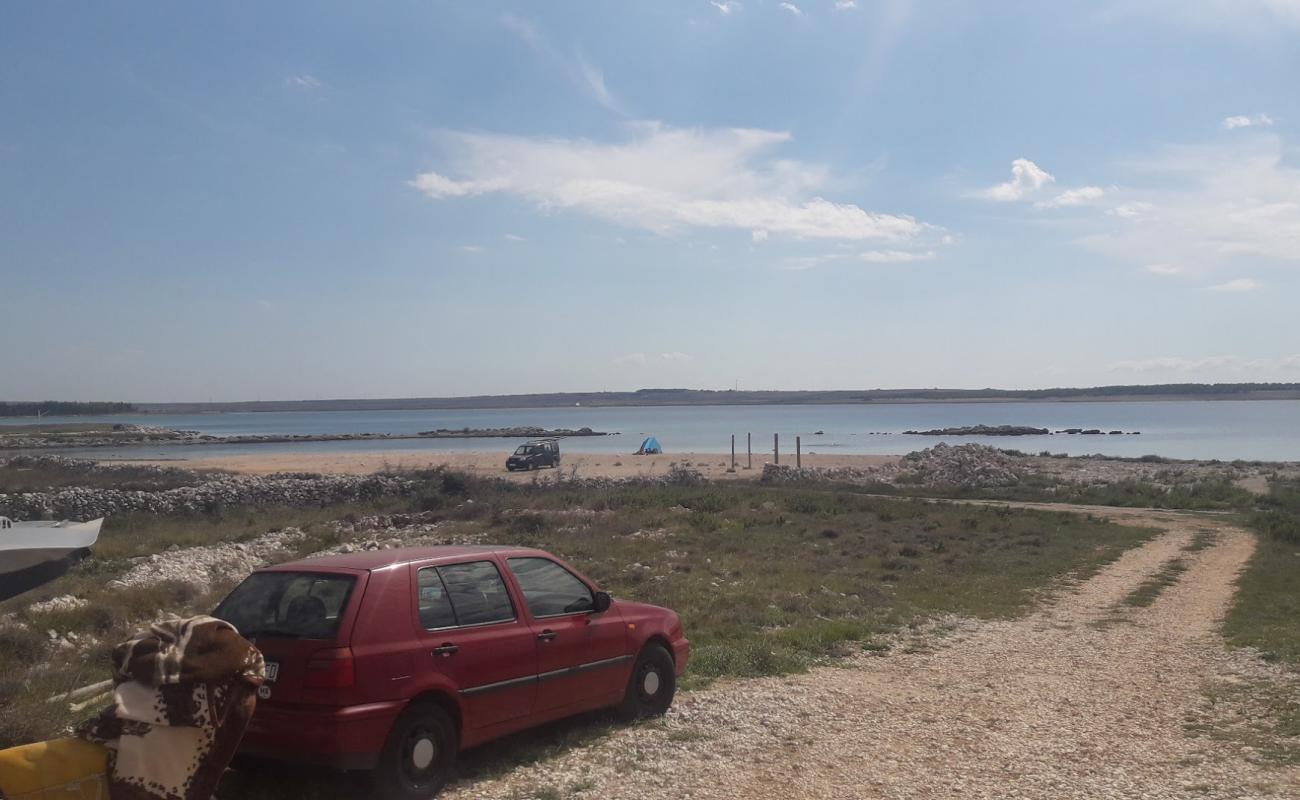 Фото Pag beach с камни поверхностью