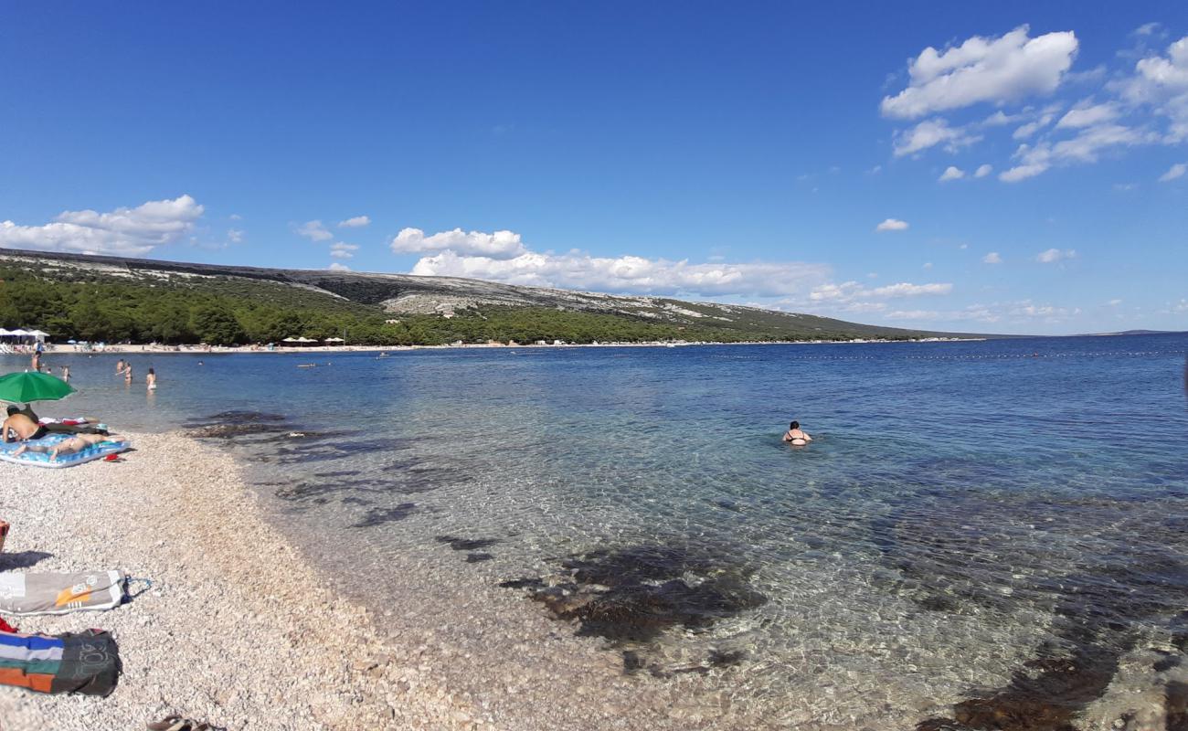 Фото Simuni III beach с белая чистая галька поверхностью