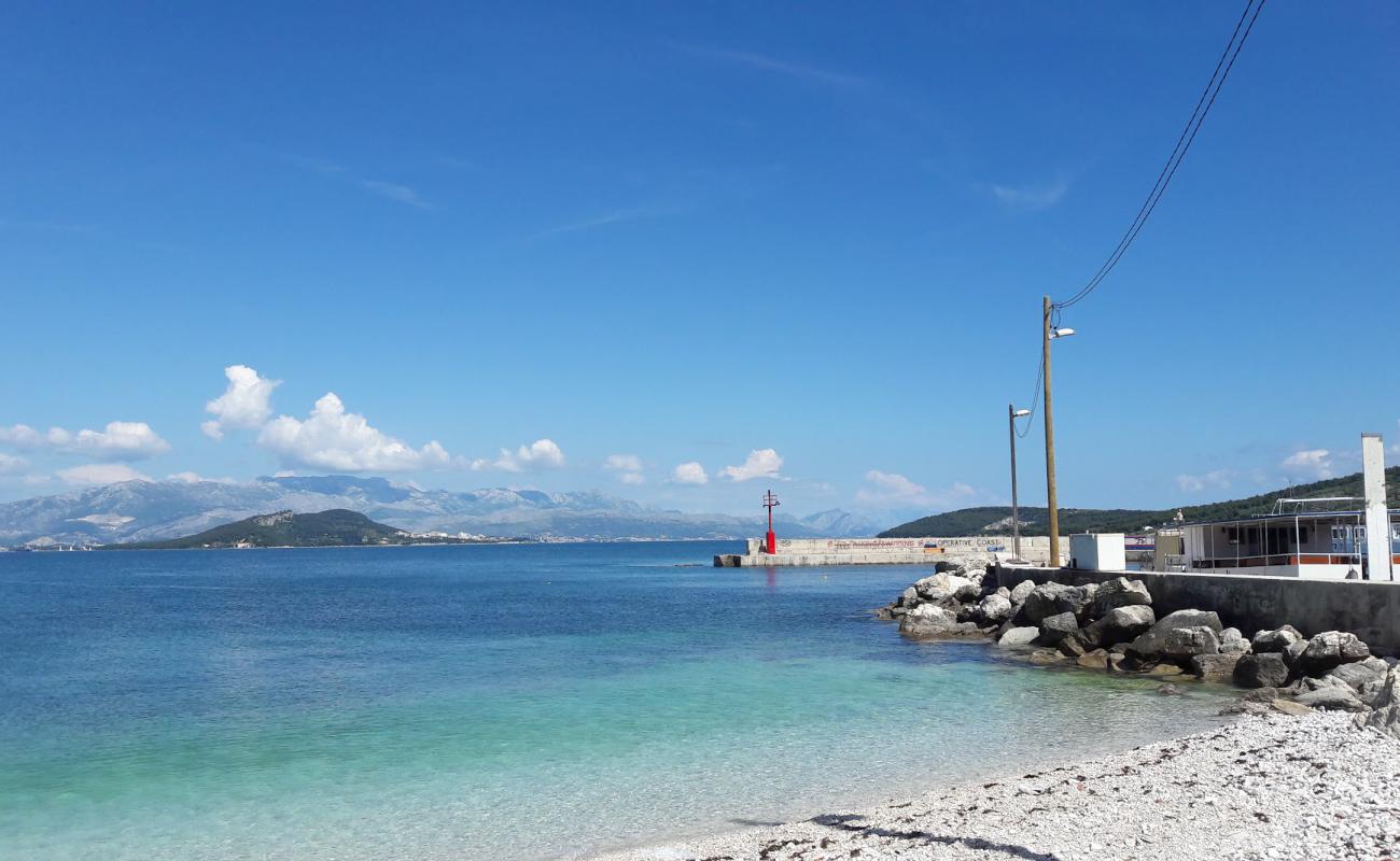 Фото Slatine III beach с светлая галька поверхностью