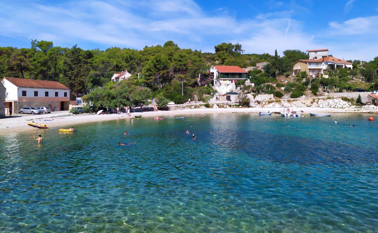 Фото Banje beach с светлая галька поверхностью