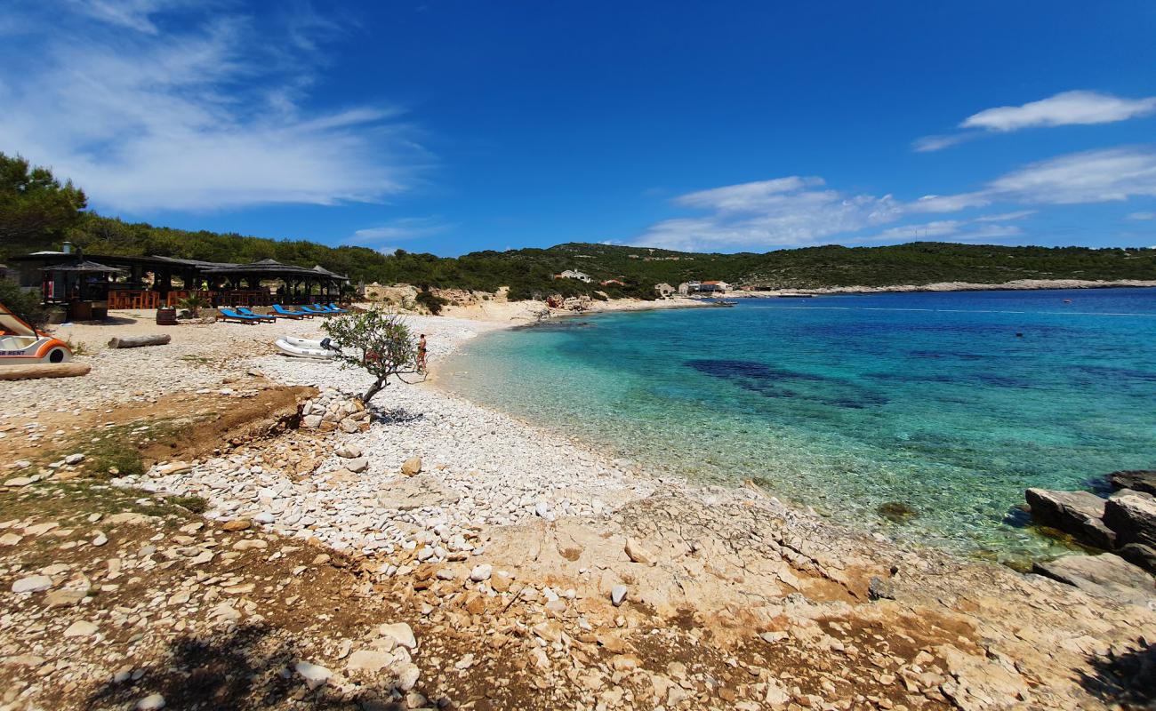 Фото Teplus beach с светлая галька поверхностью