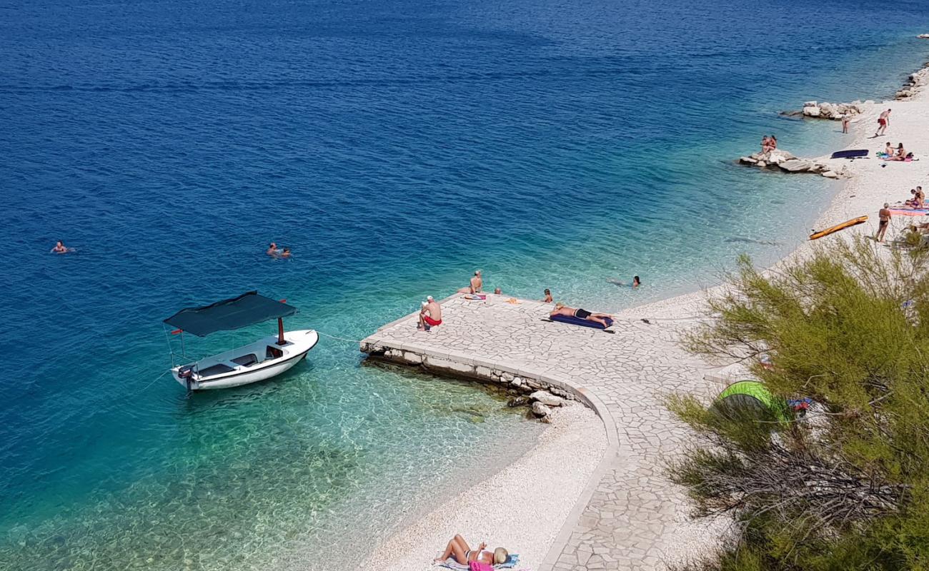 Фото Lucica beach с светлая галька поверхностью