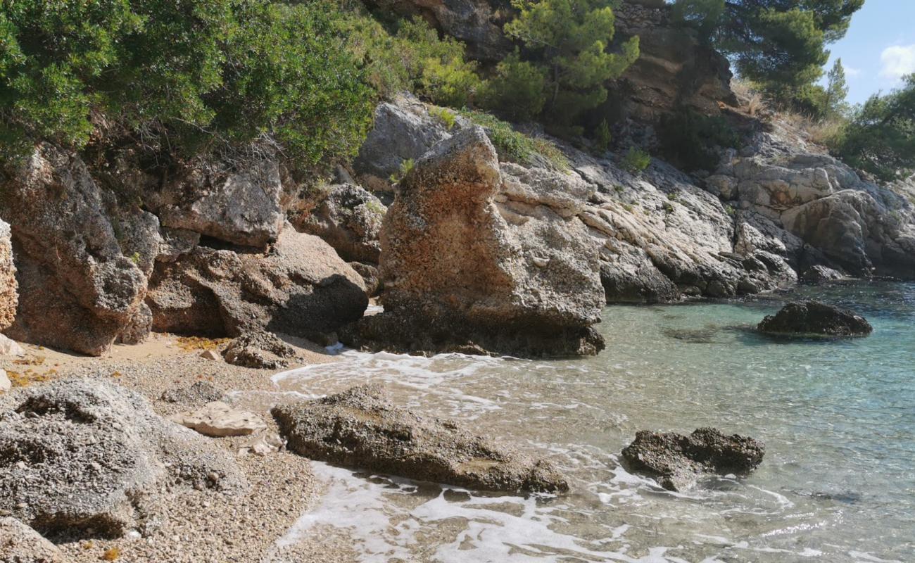 Фото Paradise beach of Ciccio с белая чистая галька поверхностью