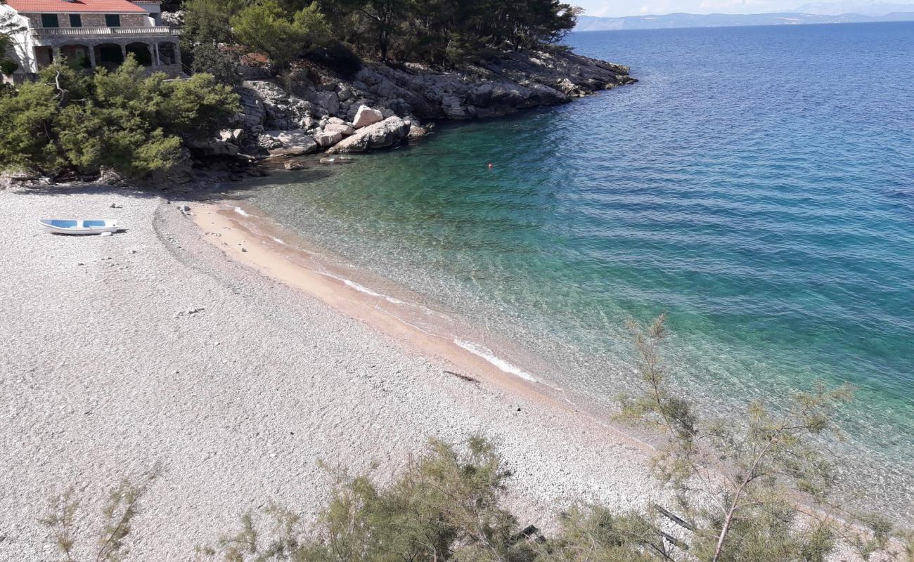 Фото Robinson beach с белая чистая галька поверхностью