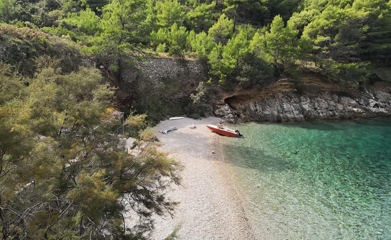 Фото Didina beach с светлая галька поверхностью